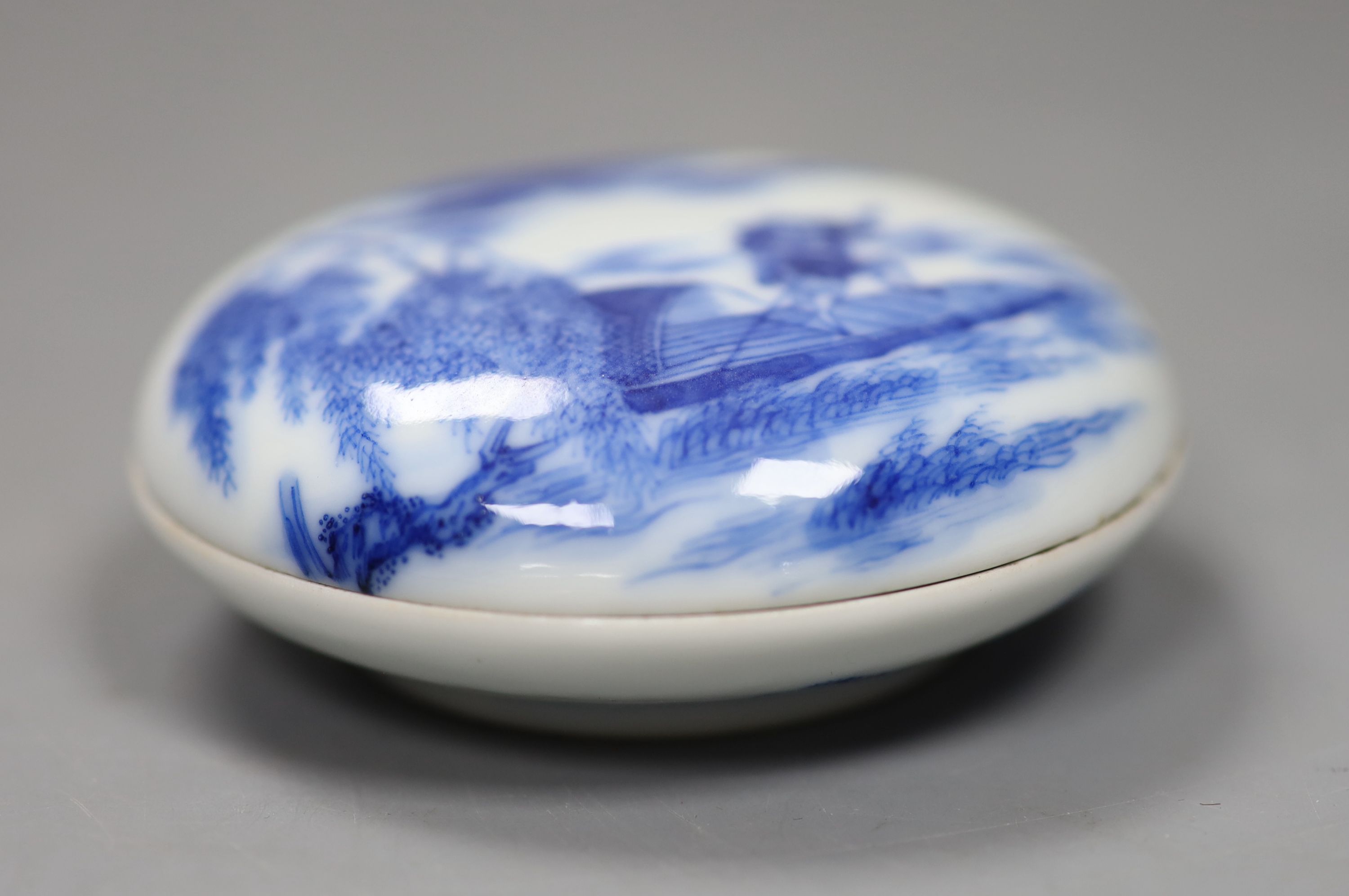 A late 19th century Chinese blue and white seal paste box, diameter 8.5cm, apocryphal Qianlong mark